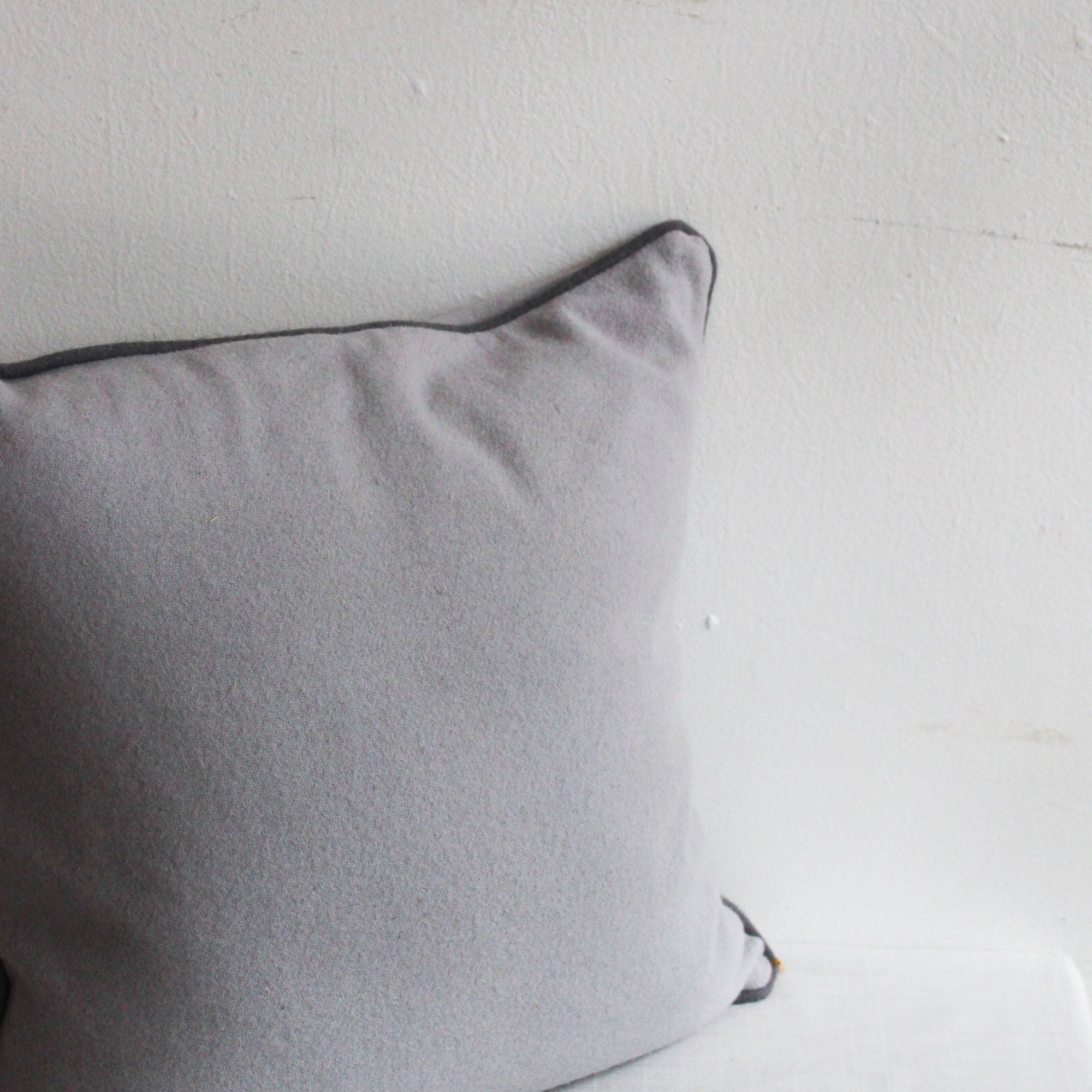 Wool Pillow with Dark Grey Piping