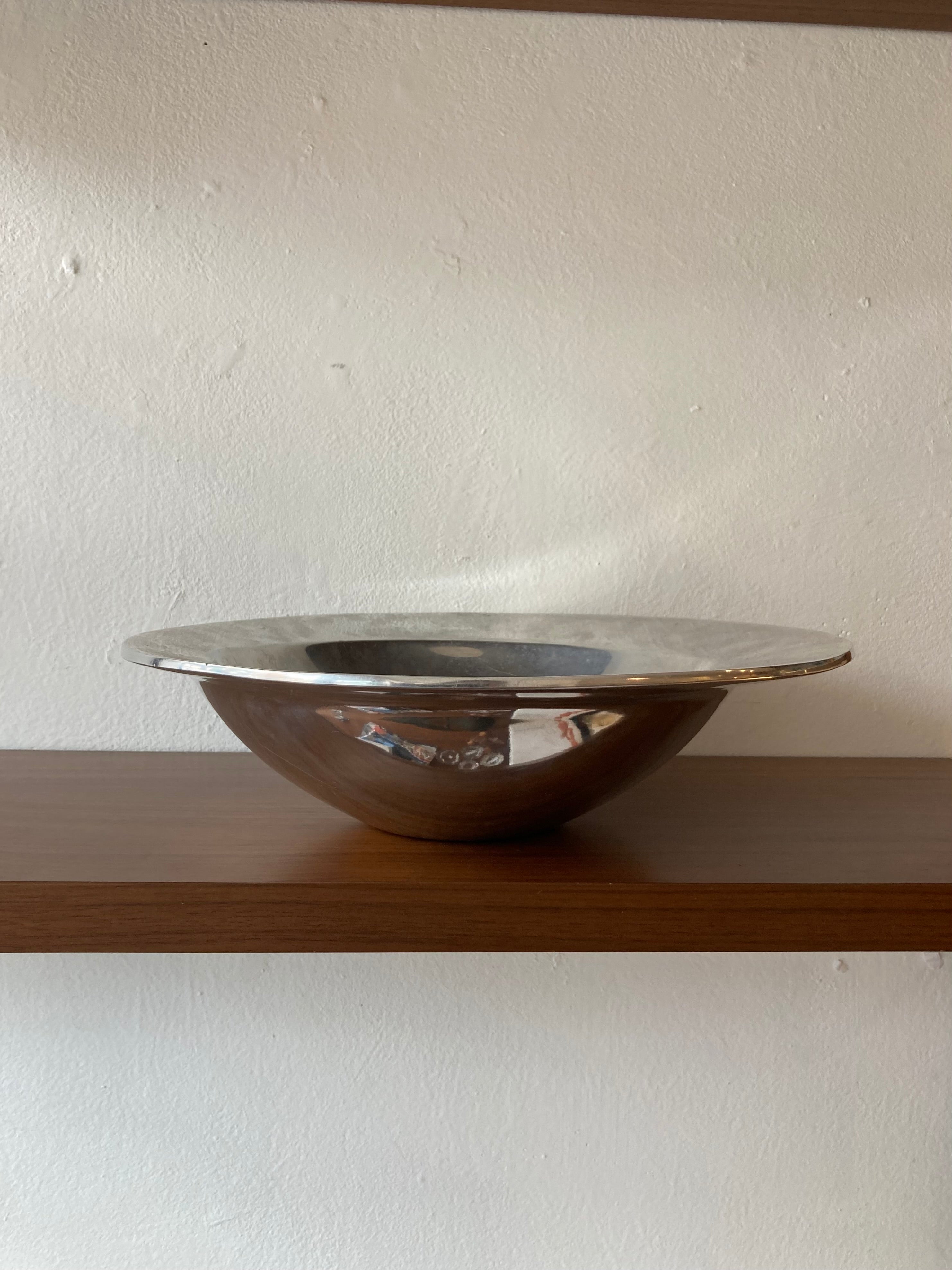 Asymmetrical nambé bowl